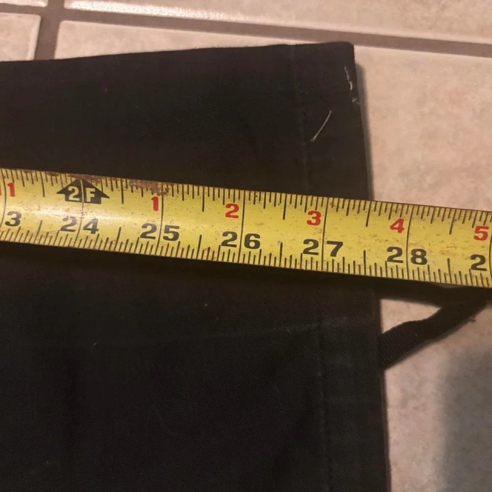 Black vintage cargo pants with adjustable waist and ankle ties